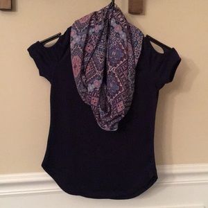 Navy blue shirt with patterned scarf